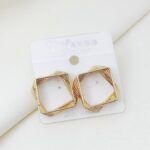 گوشواره زنانه مدل برنجی سه بعدی